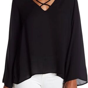 lush criss cross bell sleeve blouse